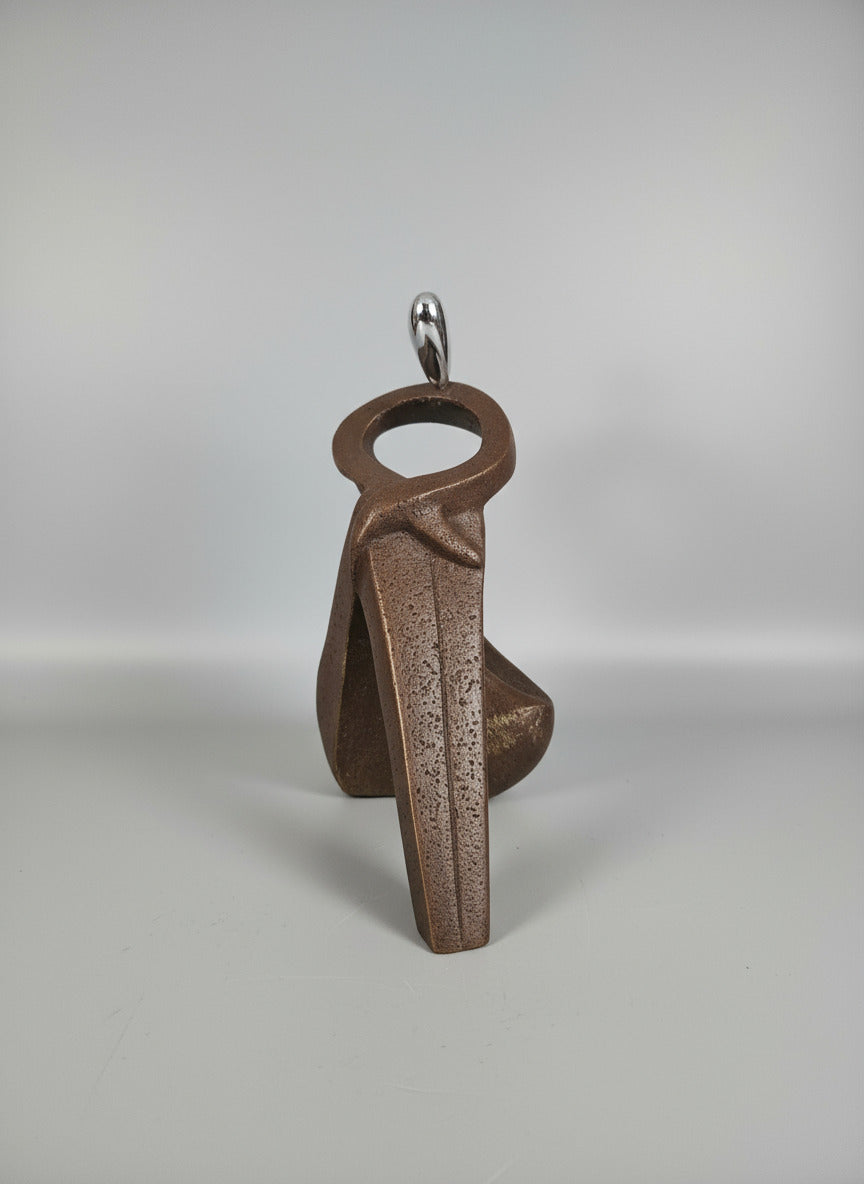 Silver Serenity – Seated Figurine